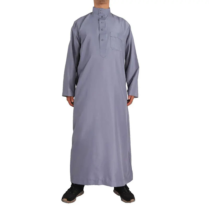 A retro long-sleeve Arab robe designed for comfort and dignity. Perfect for prayers, gatherings, and everyday wear.