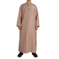A retro long-sleeve Arab robe designed for comfort and dignity. Perfect for prayers, gatherings, and everyday wear.