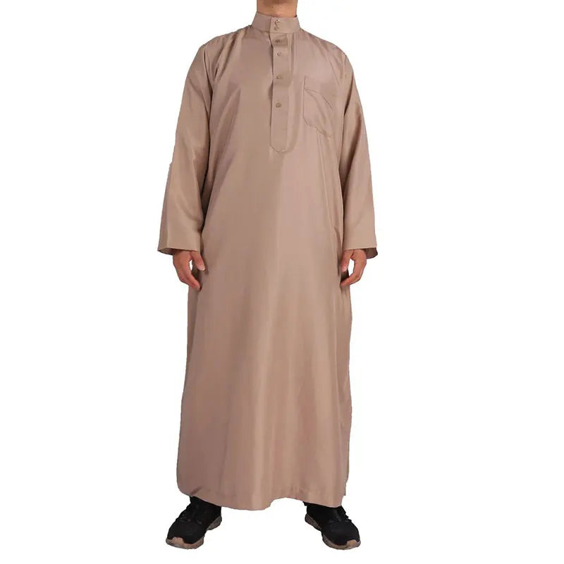 A retro long-sleeve Arab robe designed for comfort and dignity. Perfect for prayers, gatherings, and everyday wear.